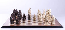 Load image into Gallery viewer, Marble and Resin Christopher Columbus Pieces on Walnut and Maple Board
