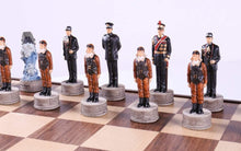 Load image into Gallery viewer, Pearl Harbor Chess Pieces on Walnut and Maple Chest
